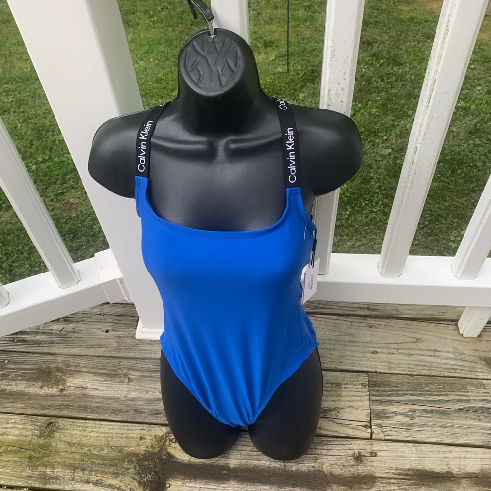 Calvin Klein one piece swimsuit blue black logo straps crisscrossing in back NWT